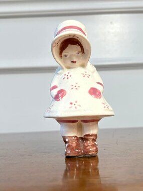 Vintage girl in bonnet porcelain figurine